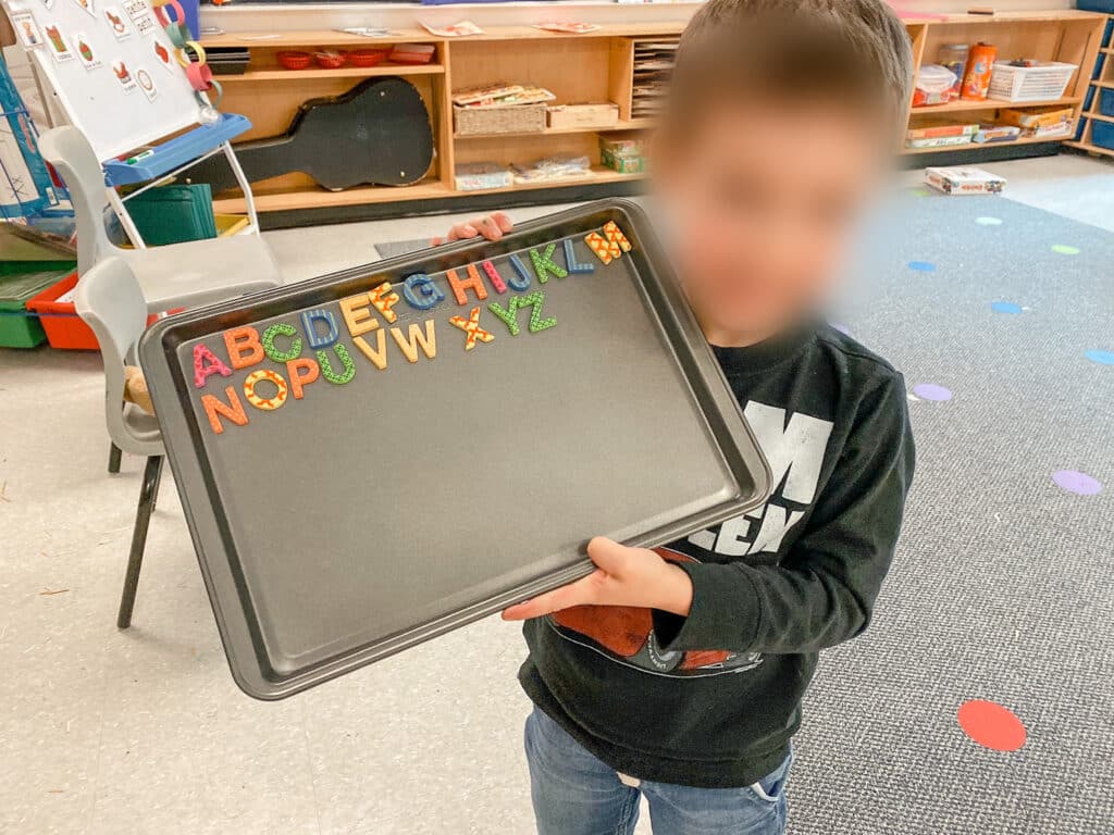 Here is an example of a student who wrote out the alphabet using magnetic letters.