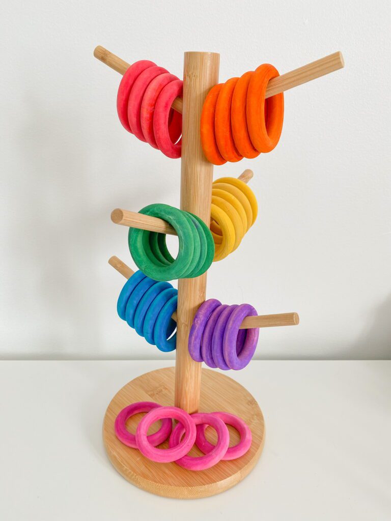 Here is a mug tree that is being used for sorting wooden rings. The rings were dyed using liquid watercolour.