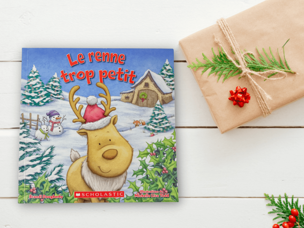 This book is called le renne trop petit. It is a French Christmas book for kids