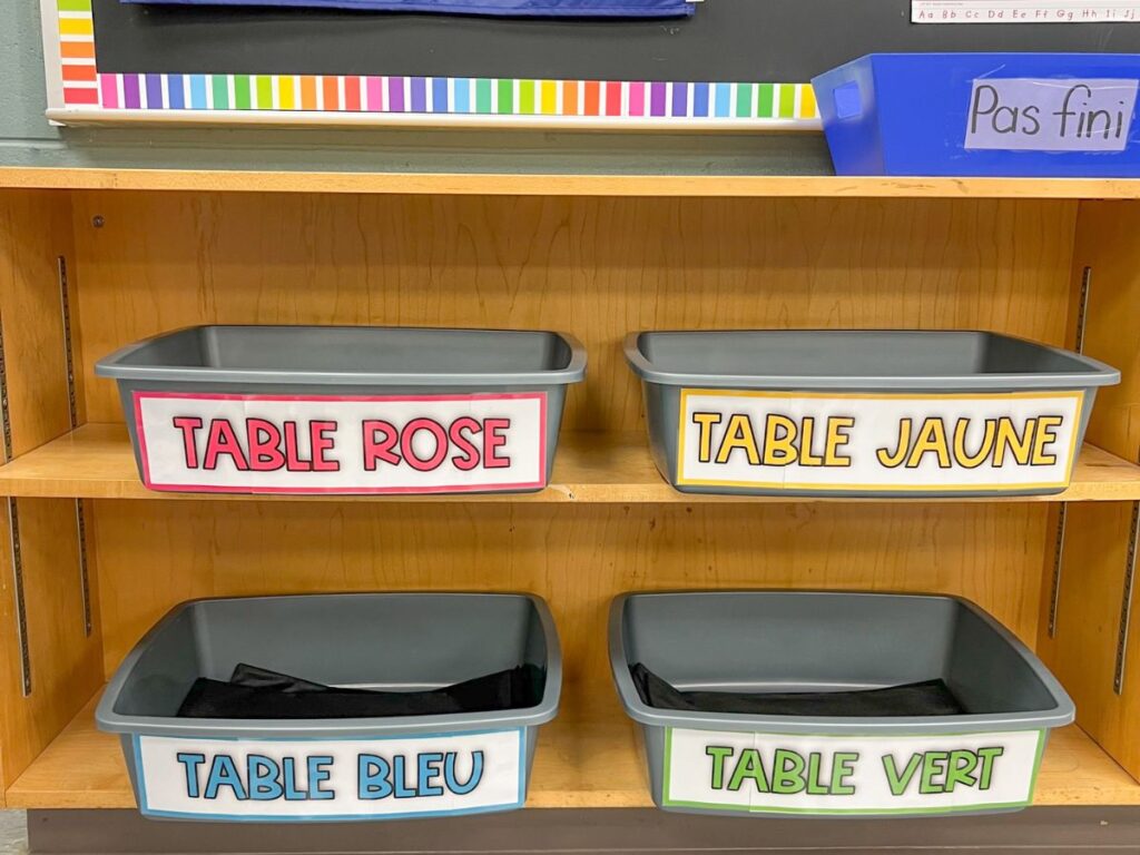 How to organize student belongings in the classroom with table bins