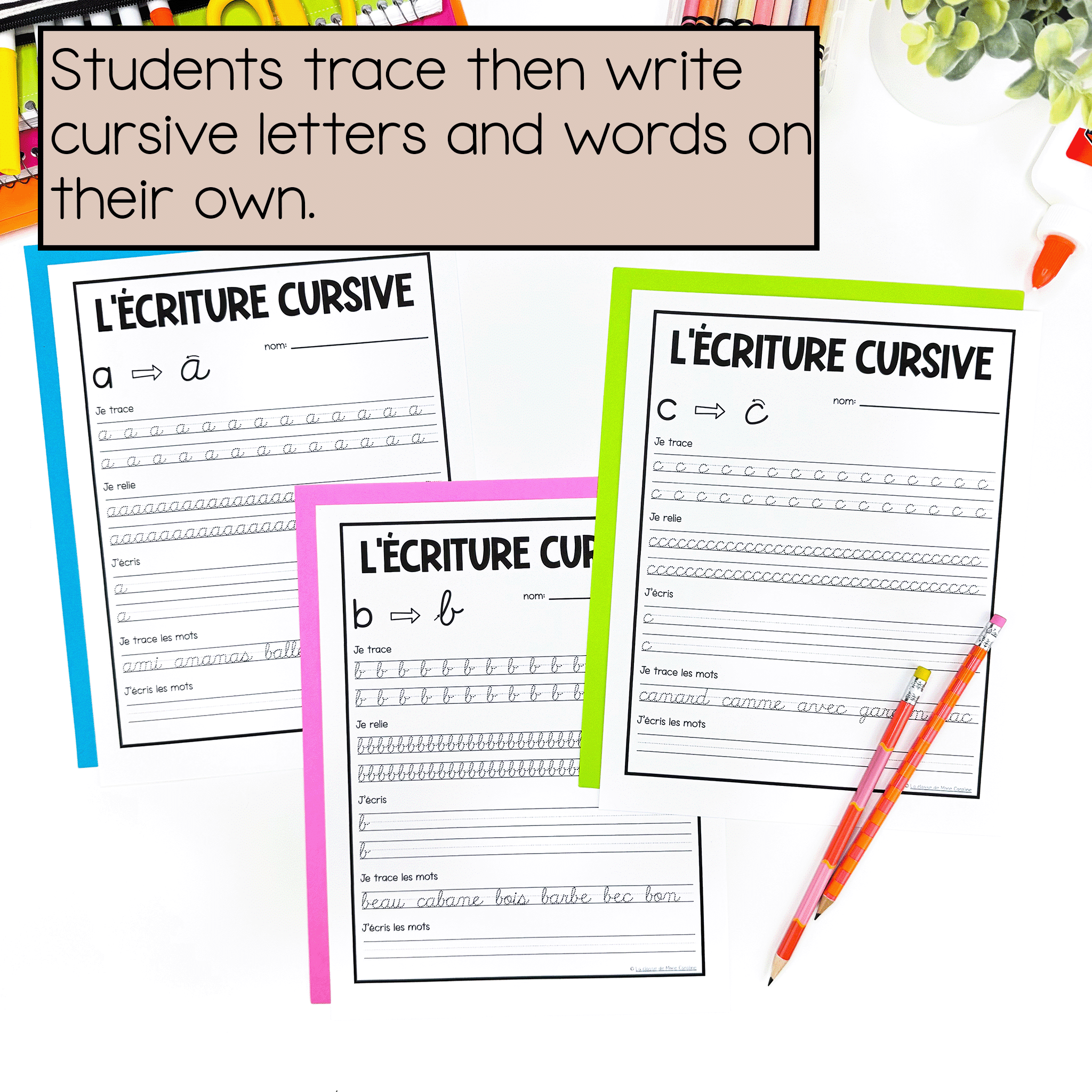 students trace and then write cursive letters